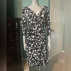 London Times cream and black wrap dress with a hole on the seam- see pics M-L